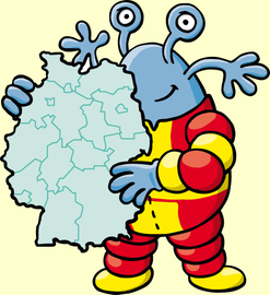 XÜ hält eine Deutschlandkarte.